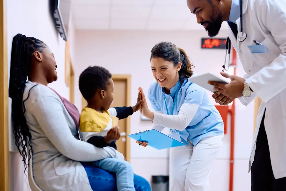 Healthcare Agencies Small Boy Getting High Five